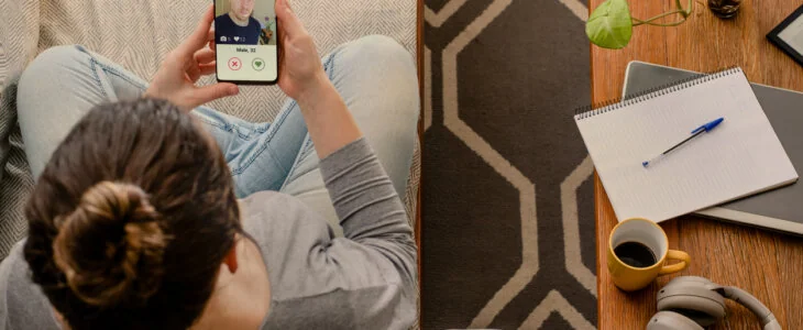 Woman using dating app on mobile phone